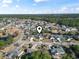 Aerial view of the community featuring lush greenery, ponds, and well-maintained lawns at 2668 Corn Pile Rd., Myrtle Beach, SC 29588