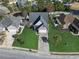 Aerial view of the home with lush green lawn, mature landscaping, and a long driveway leading to the front entry at 2668 Corn Pile Rd., Myrtle Beach, SC 29588