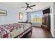 Comfortable bedroom with a ceiling fan, a window and wood floors at 2668 Corn Pile Rd., Myrtle Beach, SC 29588