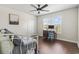 Bedroom with a ceiling fan, a window, and wood floors at 2668 Corn Pile Rd., Myrtle Beach, SC 29588