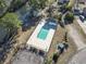 Community pool with a separate bathhouse, green space, and parking lot at 2668 Corn Pile Rd., Myrtle Beach, SC 29588