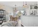 Beautiful dining area adjacent to kitchen, featuring an elegant chandelier and sliding glass doors to the patio at 2668 Corn Pile Rd., Myrtle Beach, SC 29588