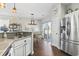 Kitchen area view featuring marble countertops, stainless steel appliances and an open dining area at 2668 Corn Pile Rd., Myrtle Beach, SC 29588