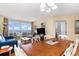 Living room featuring ocean views, slider access to the balcony and a large dining table at 2701 S Ocean Blvd. # 202, North Myrtle Beach, SC 29582