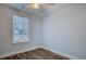 Bedroom with wood-look floors, fan, and window at 2705 Mercer Dr. # 2705, Conway, SC 29526