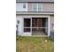 View of the screened patio with brick, opening to the backyard at 2705 Mercer Dr. # 2705, Conway, SC 29526