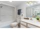 Bathroom with shower/tub combination, toilet, vanity, and decorative accents at 2710 S Ocean Blvd. # 1010, North Myrtle Beach, SC 29582
