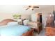 Cozy bedroom with two beds, a ceiling fan, and tropical decor for a relaxing getaway at 337 Sailors Ct., Myrtle Beach, SC 29577