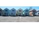 Charming multi-colored row of homes with porches and parking, showcasing coastal community living at 337 Sailors Ct., Myrtle Beach, SC 29577