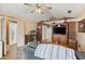 Open-concept living room featuring hardwood floors, neutral colors, a ceiling fan, and ample natural light at 403 Sean River Rd., Conway, SC 29526