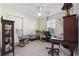 Inviting home office featuring a ceiling fan, desk, and neutral carpet at 403 Sean River Rd., Conway, SC 29526