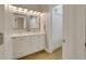 Bathroom featuring a double vanity, marble countertops and great lighting at 417 Seabreeze Dr., Garden City Beach, SC 29576