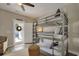 Bedroom featuring a bunk bed and access to the outdoor pool area at 417 Seabreeze Dr., Garden City Beach, SC 29576