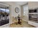 Cozy breakfast nook with a round table, two chairs, and a view of the outdoor deck at 417 Seabreeze Dr., Garden City Beach, SC 29576