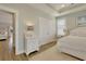 Relaxing bedroom featuring a ceiling fan, an area rug and great natural light at 417 Seabreeze Dr., Garden City Beach, SC 29576