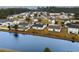 High angle showcasing a well-planned neighborhood with mature trees, a pond, and private backyards at 4355 Heartwood Ln., Myrtle Beach, SC 29579