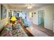 Inviting living room with lots of light, leading to other rooms in the home at 4430 Eastport Blvd. # L9, Little River, SC 29566