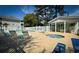 Inviting pool area features a hot tub, covered gazebo, lounge chairs and pristine fenced area at 4430 Eastport Blvd. # L9, Little River, SC 29566