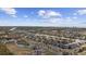 Beautiful aerial view showcasing the community's waterfront location and waterway access with city skyline in the distance at 4520 N Plantation Harbour Dr. # F9, Little River, SC 29566