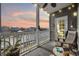 Relax on this covered balcony at sunset with a river view at 4520 N Plantation Harbour Dr. # F9, Little River, SC 29566