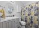Bathroom with a modern vanity, tiled floor, and decorative shower curtain at 4520 N Plantation Harbour Dr. # F9, Little River, SC 29566