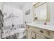 Bright bathroom with vanity, decorative shower curtain, and neutral colors at 4520 N Plantation Harbour Dr. # F9, Little River, SC 29566