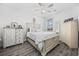 Comfortable bedroom with a king bed and stylish neutral decor at 4520 N Plantation Harbour Dr. # F9, Little River, SC 29566