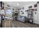 This fun bedroom is complete with light gray flooring and Carolina Panthers décor at 4520 N Plantation Harbour Dr. # F9, Little River, SC 29566