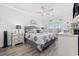 Cozy bedroom with a decorative fish, ceiling fan, and access to a balcony at 4520 N Plantation Harbour Dr. # F9, Little River, SC 29566