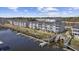 Exterior view of the building featuring a pier and waterway access at 4520 N Plantation Harbour Dr. # F9, Little River, SC 29566
