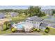 Community clubhouse with a refreshing in-ground pool and hot tub, ideal for relaxation and social gatherings at 4520 N Plantation Harbour Dr. # F9, Little River, SC 29566