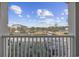 Balcony view overlooking the parking lot, golf course, and the fountain at 4520 N Plantation Harbour Dr. # F9, Little River, SC 29566