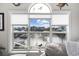 Beautiful water view from a large window, showcasing waterfront homes and docks at 4520 N Plantation Harbour Dr. # F9, Little River, SC 29566