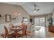 Dining and living area with high ceilings and lots of natural light from sliding glass doors to the screened porch at 4865 Luster Leaf Circle # 402, Myrtle Beach, SC 29577