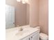 Bathroom showcasing a vanity with a sink, mirror, white cabinet, and a toilet at 505 Hay Hill Ln. # B, Myrtle Beach, SC 29579