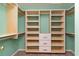 Walk-in closet with custom built-in shelves and ample storage space at 505 Hay Hill Ln. # B, Myrtle Beach, SC 29579