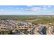 A stunning aerial view of a neighborhood featuring lush forests, serene ponds, and beautiful homes at 509 Hillsborough Dr., Conway, SC 29526