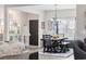 Inviting dining room features stylish chandelier and direct access to the front door at 509 Hillsborough Dr., Conway, SC 29526