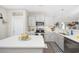 Modern kitchen featuring gray cabinetry, quartz countertops, stainless steel appliances, and stylish decor at 509 Hillsborough Dr., Conway, SC 29526