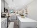 Charming kitchen featuring grey cabinets, stainless steel appliances, and a convenient center island at 509 Hillsborough Dr., Conway, SC 29526