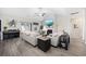 Bright living room featuring a fireplace, vaulted ceiling, modern decor, and comfortable seating at 509 Hillsborough Dr., Conway, SC 29526