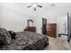Another angle of a main bedroom showcasing a well-lit en-suite bathroom at 509 Hillsborough Dr., Conway, SC 29526