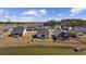 An aerial view shows the lakefront homes with fenced-in yards in a quiet neighborhood at 517 Antebellum Ln., Georgetown, SC 29440