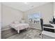 Bright bedroom featuring hardwood floors, a window, and a study space at 517 Antebellum Ln., Georgetown, SC 29440