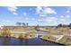 Scenic view of the community featuring waterways, marshland, and distant trees at 517 Antebellum Ln., Georgetown, SC 29440