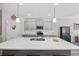 Spacious kitchen island features sleek countertops, pendant lighting, and modern appliances, perfect for cooking and entertaining at 517 Antebellum Ln., Georgetown, SC 29440
