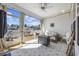 Relaxing screened porch with outdoor furniture and scenic views of the yard at 517 Antebellum Ln., Georgetown, SC 29440