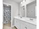 Bright bathroom with dual sinks, modern vanity, and a separate shower and toilet area at 546 Calhoun Falls Dr., Myrtle Beach, SC 29577