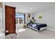 Bright bedroom featuring a blue flower themed bedspread and carpet flooring at 546 Calhoun Falls Dr., Myrtle Beach, SC 29577