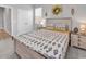 Well-lit bedroom with large bed, closet, and neutral decor at 546 Calhoun Falls Dr., Myrtle Beach, SC 29577